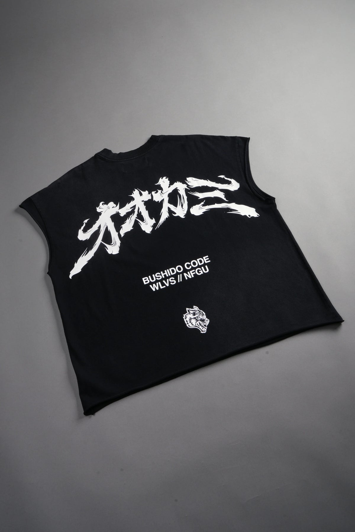 OKAMI BUSHIDO GRUNGE CUT-OFF MID LENGTH RAW HEM TEE IN BLACK SUN FADE
