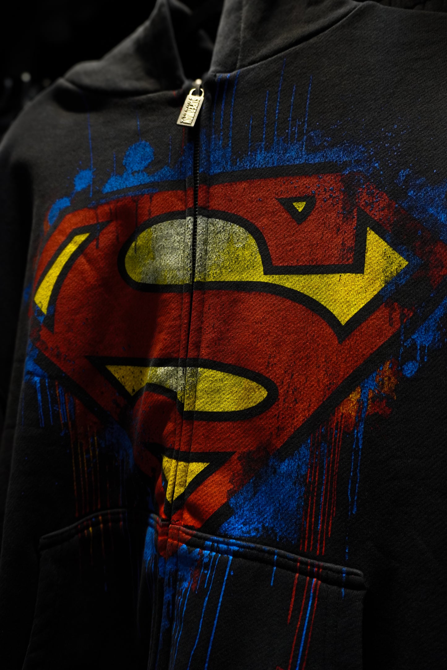 5011 - SUPERMAN DRIP ZIP-UPS