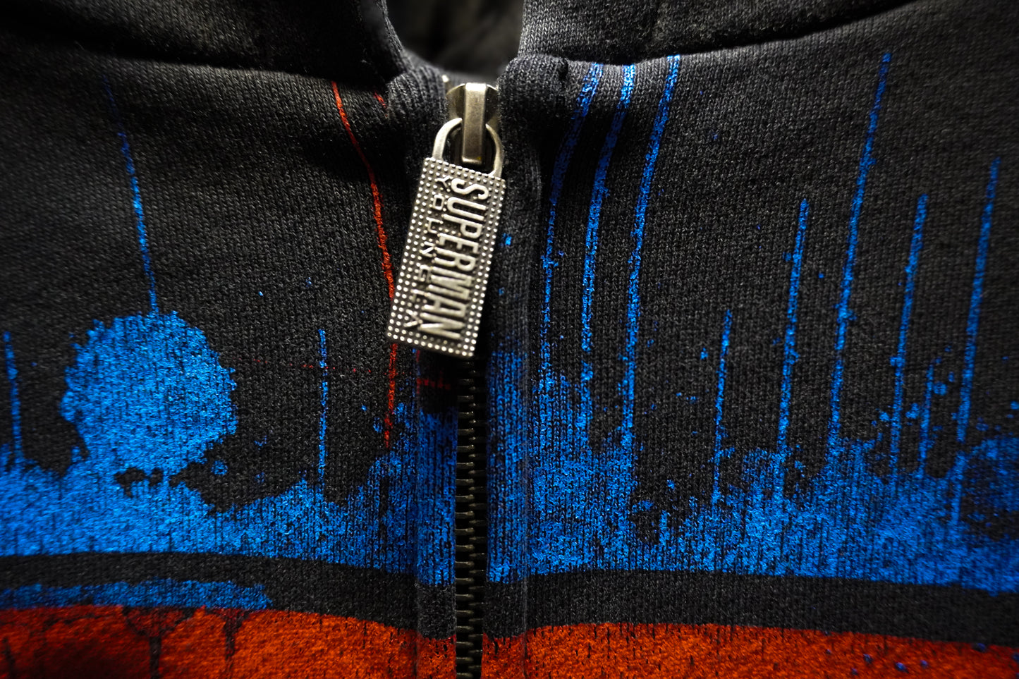5011 - SUPERMAN DRIP ZIP-UPS