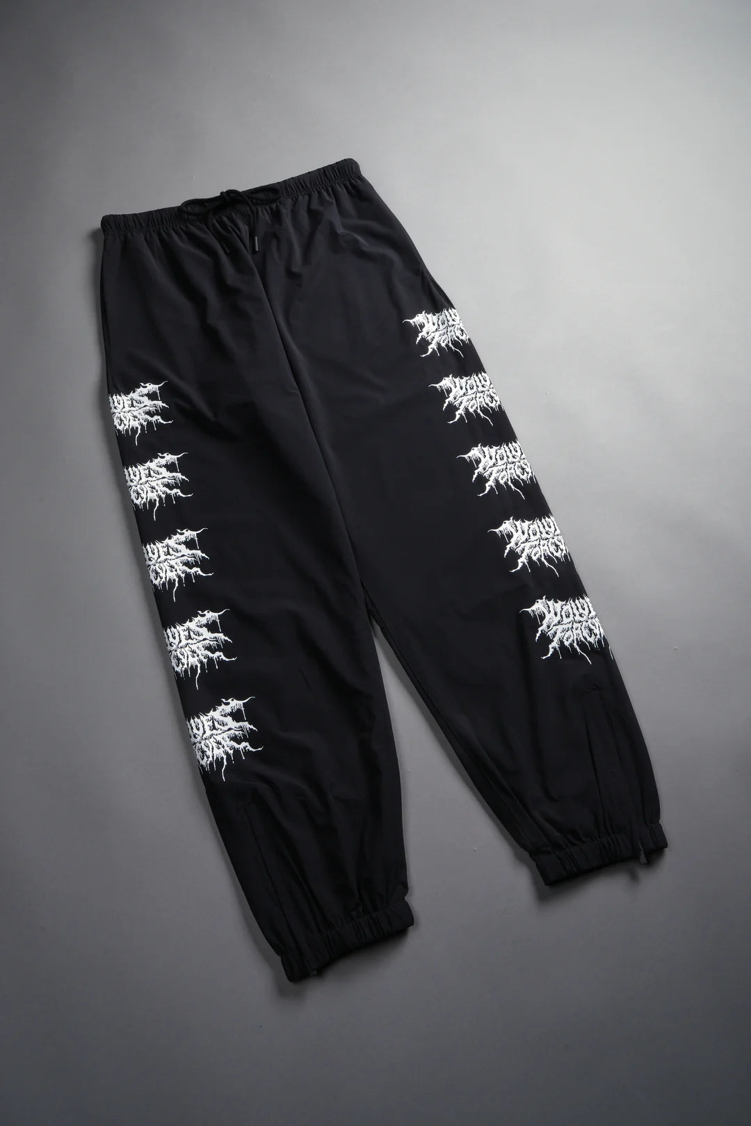 SHADOW HYBRID NYLON TRACK PANTS IN BLACK