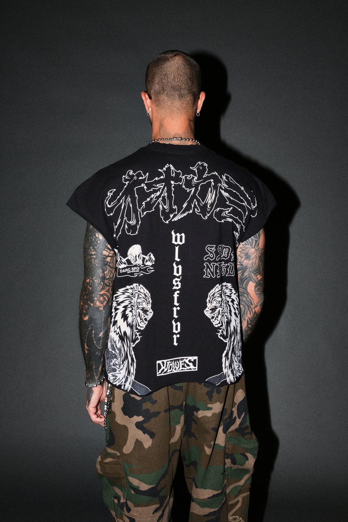 OUR CODE DISTRESSED GRUNGE CUT OFF MID LENGTH RAW HEM TEE IN BLACK